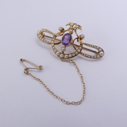 280 - An Edwardian amethyst and seed pearl Brooch, all mounted in 15ct yellow gold, 4.2cm long, 5.5g, in a... 