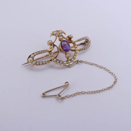 280 - An Edwardian amethyst and seed pearl Brooch, all mounted in 15ct yellow gold, 4.2cm long, 5.5g, in a... 