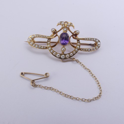 280 - An Edwardian amethyst and seed pearl Brooch, all mounted in 15ct yellow gold, 4.2cm long, 5.5g, in a... 