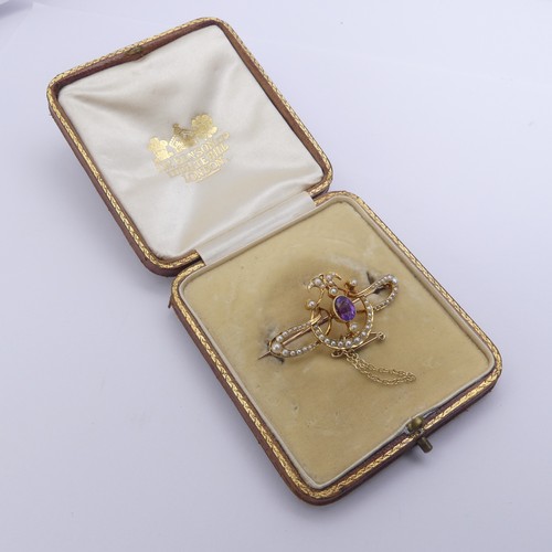 280 - An Edwardian amethyst and seed pearl Brooch, all mounted in 15ct yellow gold, 4.2cm long, 5.5g, in a... 