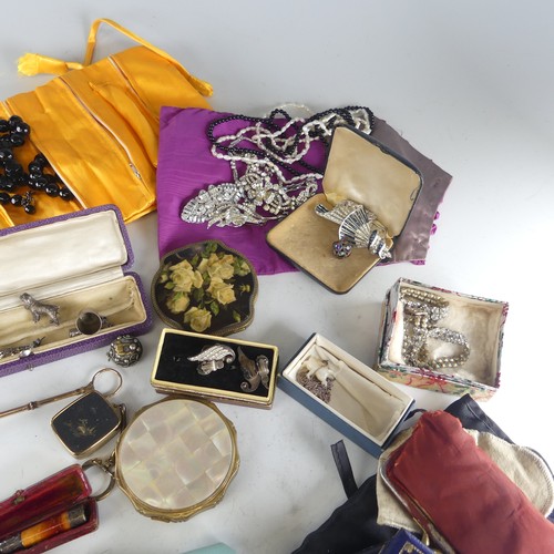 320 - A quantity of Costume Jewellery, including a gilt metal hinged bangle, probably Indian , the front s... 