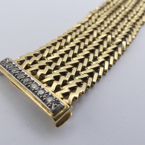 273 - An 18ct yellow gold mesh Bracelet, with integral clasp and diamond set safety bar, 2.8cm wide, 19cm ... 