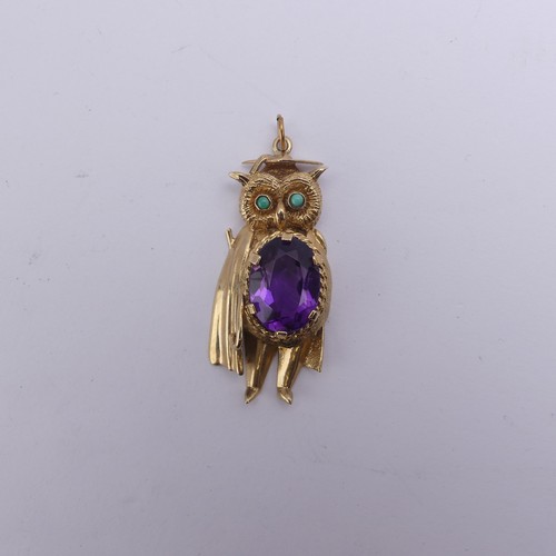 259 - A 9ct yellow gold 'Wise Owl' Pendant, modelled wearing a mortar board and gown, with central oval fa... 