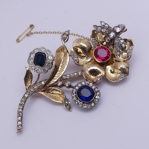 283 - A striking gem set foliate Brooch, formed from other pieces of jewellery including a sapphire and di... 