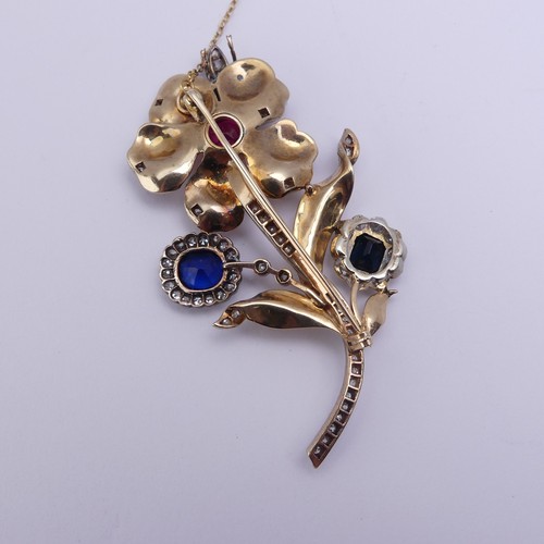 283 - A striking gem set foliate Brooch, formed from other pieces of jewellery including a sapphire and di... 