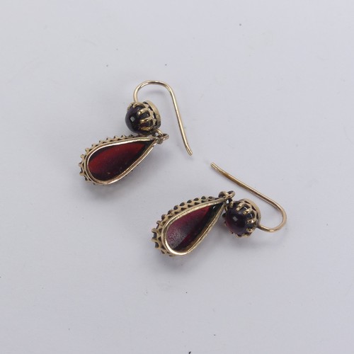 284 - A pair of cabochon garnet drop Earrings, mounted in unmarked gold, tested as 9ct gold, 26mm long.... 