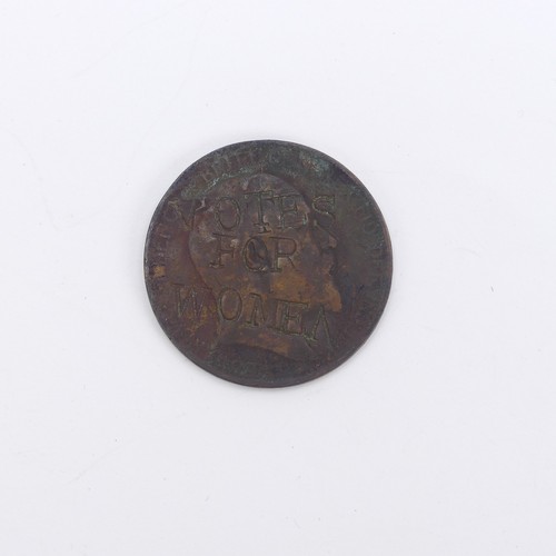 323 - Suffragette Interest; A 'Votes for Women' defaced Penny coin, dated 1908, together with a padlock an... 