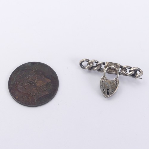 323 - Suffragette Interest; A 'Votes for Women' defaced Penny coin, dated 1908, together with a padlock an... 