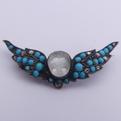 286 - A Victorian carved moonstone Cherub Brooch, with turquoise and rose cut diamond set wings, all mount... 