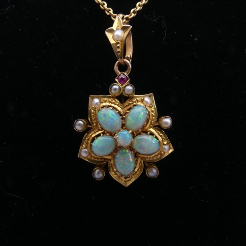 261 - An antique opal Pendant, the five oval opals and one small circular forming the central flowerhead c... 