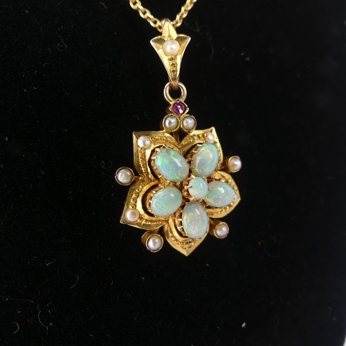 261 - An antique opal Pendant, the five oval opals and one small circular forming the central flowerhead c... 