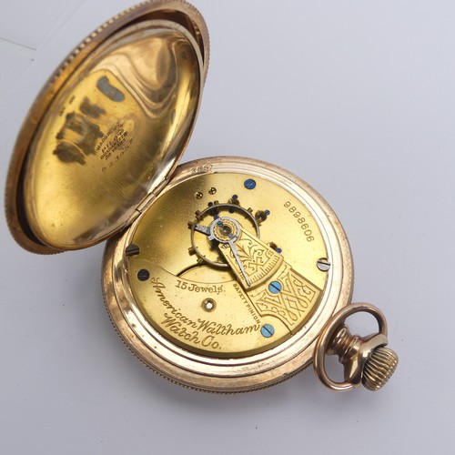 157 - An early 20thC Waltham gold plated hunter Pocket Watch, the signed white enamel dial with Roman nume... 