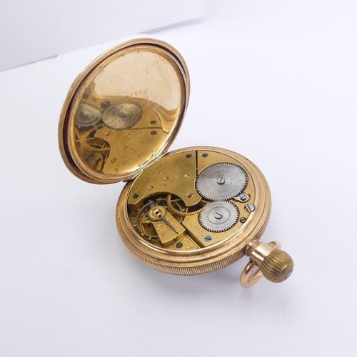 157 - An early 20thC Waltham gold plated hunter Pocket Watch, the signed white enamel dial with Roman nume... 