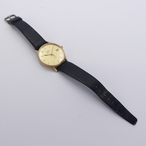 129 - A 9ct yellow gold Garrard quartz Wristwatch, the reverse with presentation inscription, 33mm diamete... 