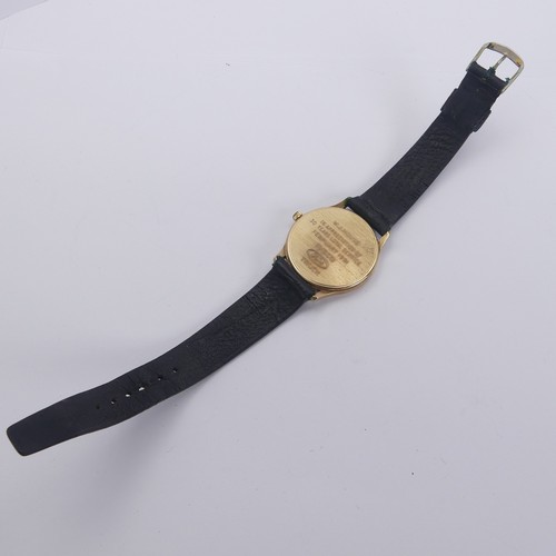 129 - A 9ct yellow gold Garrard quartz Wristwatch, the reverse with presentation inscription, 33mm diamete... 