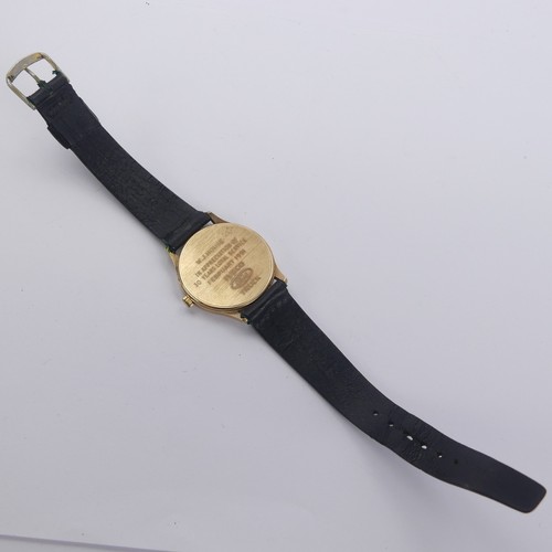 129 - A 9ct yellow gold Garrard quartz Wristwatch, the reverse with presentation inscription, 33mm diamete... 