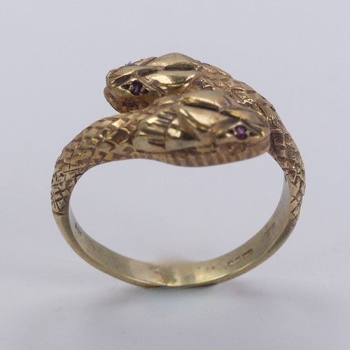 236 - A 9ct yellow gold double snake Ring, with ruby eyes, Birmingham import marks for 1986, Size N, 3.6g.... 