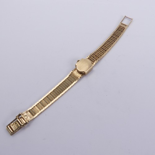 126 - A 9ct yellow gold lady's Rotary Wristwatch, with 21-jewels manual wind movement, on integral 9ct gol... 