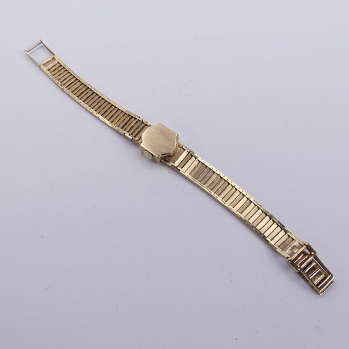 126 - A 9ct yellow gold lady's Rotary Wristwatch, with 21-jewels manual wind movement, on integral 9ct gol... 