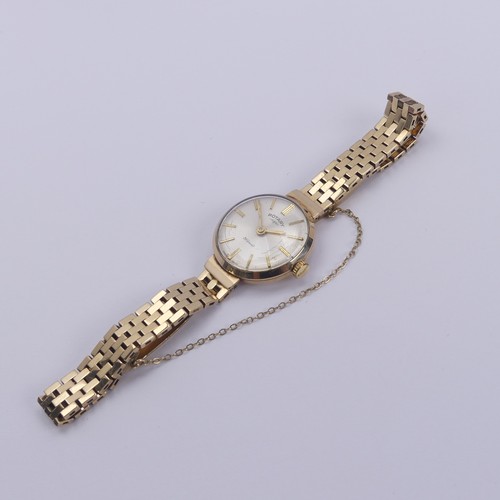 135 - A 9ct gold lady's Rotary Wristwatch, the silvered circular dial with 21-jewels movement, 21mm diamet... 