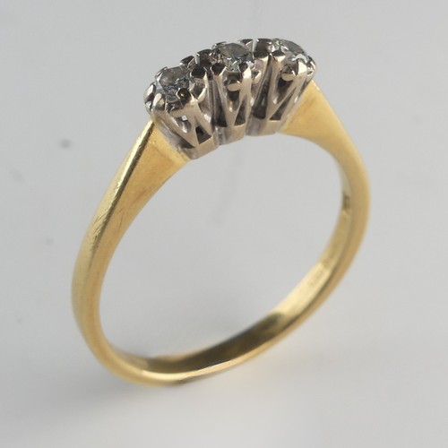 240 - A three stone diamond Ring, total diamond weight approx. 0.25ct, all mounted in 18ct yellow and whit... 