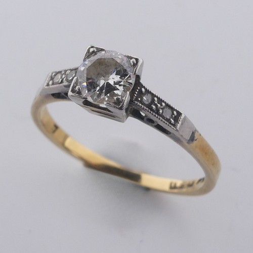 188 - A single stone diamond Ring, the circular stone approx. 0.4ct, in squared mount with two small diamo... 