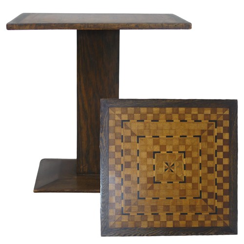 551 - An Arts and Crafts oak and inlaid Table, the square top with geometric inlay raised on central pilla... 