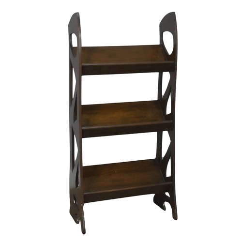 560 - A Glasgow school Arts and Crafts oak Bookshelf/Stand, the sides with stylised piercing, W 45,5 cm x ... 