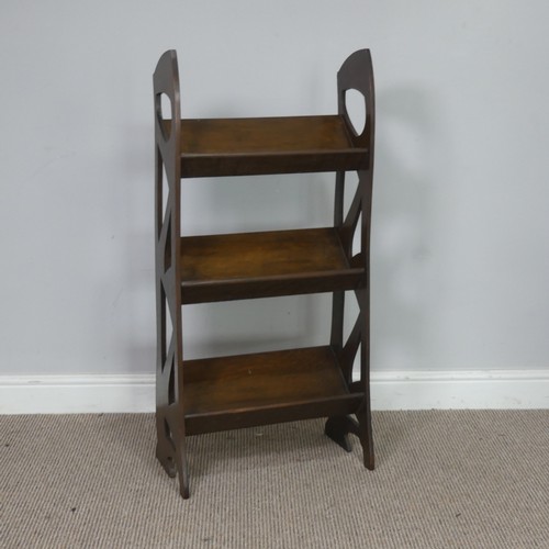 560 - A Glasgow school Arts and Crafts oak Bookshelf/Stand, the sides with stylised piercing, W 45,5 cm x ... 