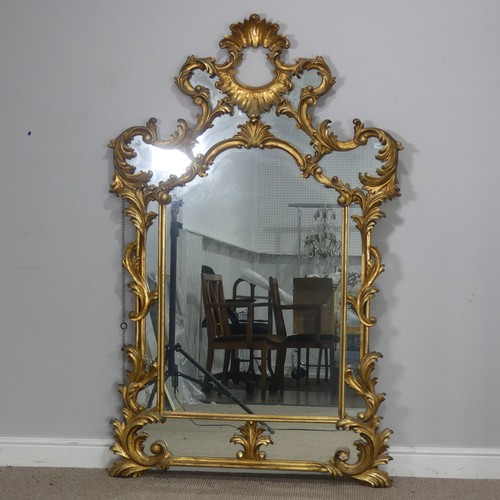 509 - A large 19th century style giltwood framed wall Mirror, the frame decorated with acanthus leaves and... 