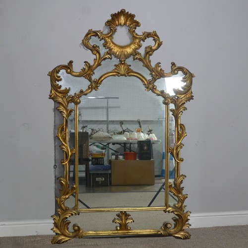 509 - A large 19th century style giltwood framed wall Mirror, the frame decorated with acanthus leaves and... 