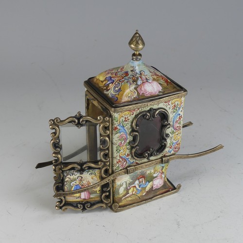 101 - A 19thC Viennese silver gilt and enamel miniature Sedan Chair, the hinged door revealing glazed shel... 