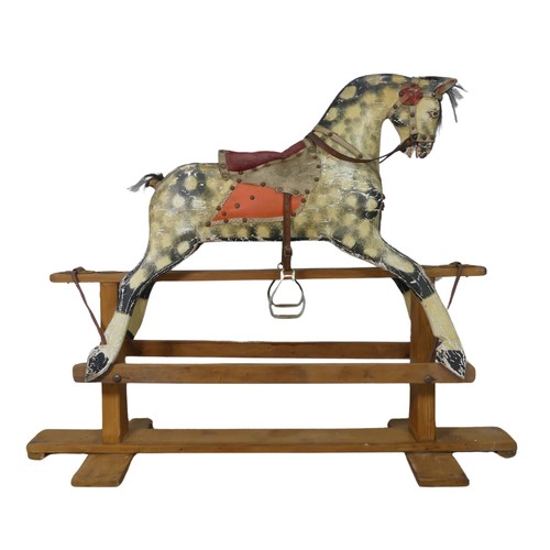 562 - An antique painted Rocking Horse, note, with wear and losses commensurate to daily use and age, see ... 