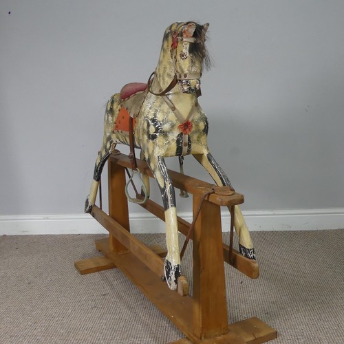 562 - An antique painted Rocking Horse, note, with wear and losses commensurate to daily use and age, see ... 