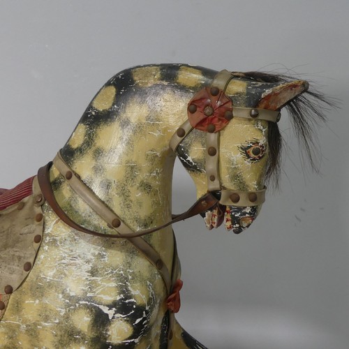 562 - An antique painted Rocking Horse, note, with wear and losses commensurate to daily use and age, see ... 