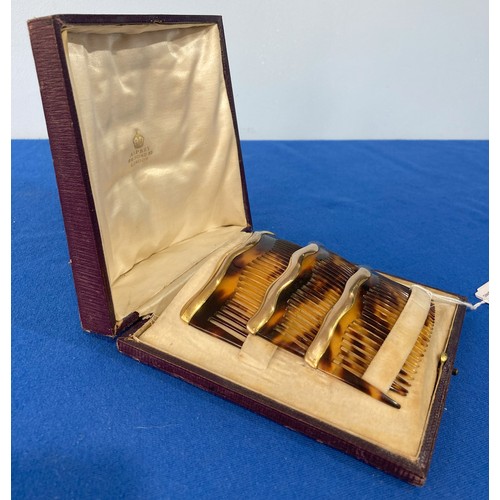 330 - Asprey; An early 20thC cased trio of graduated tortoiseshell Combs / Hair Ornaments, of domed form w... 