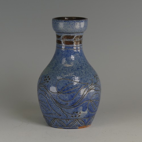 30 - Herman Edwin Fishley (1858-1913) a Fremington Pottery Vase, of mottled blue ground with incised flor... 