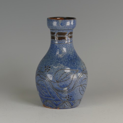 30 - Herman Edwin Fishley (1858-1913) a Fremington Pottery Vase, of mottled blue ground with incised flor... 