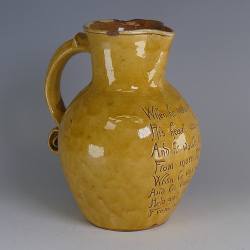 19 - Edwin Beer Fishley (1832-1912) a Fremington pottery mottoware Jug, in typical yellow glaze with inci... 