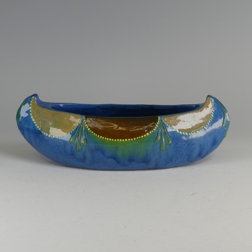 49 - William Fishley Holland (1888-1971) an unusual Braunton pottery navette shaped Dish, decorated in bl... 