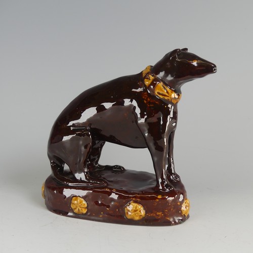 31 - A Fremington Pottery hand built figure of a Greyhound, by Will Short in Wrotham colour scheme with m... 