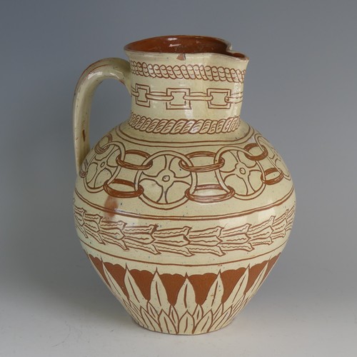 46 - William Fishley Holland (1888-1971) a Braunton pottery Harvest Jug, with white slip profusely decora... 