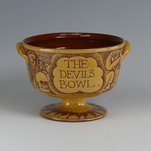 63 - Harry Juniper (b. 1947) a Bideford Pottery 'Devil's Bowl', in honey slip decorated profusely with sg... 