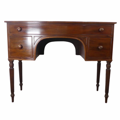 589 - A William IV style mahogany bow-front dressing Table, frieze drawer over kneehole, flanked by deep d... 