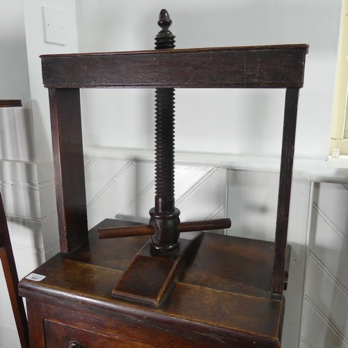 607 - A George III oak Book Press on Chest of Drawers, the rectangular press with turned thread and acorn ... 