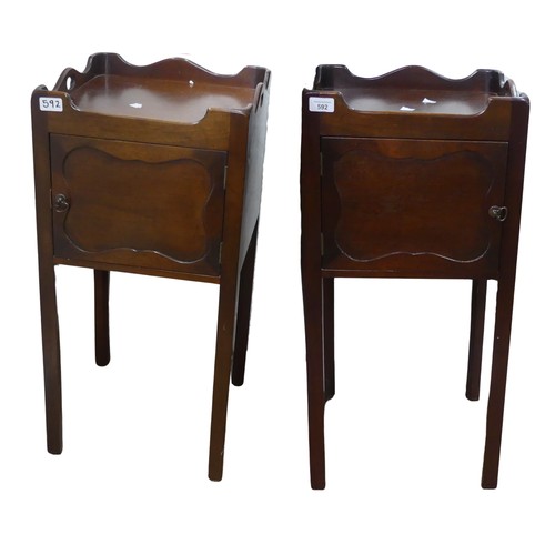 592 - A pair of George III style mahogany bedside Tables/pot Cupboards, square moulded and pierced tray to... 