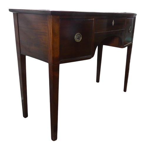 586 - A Georgian mahogany bow-front dressing Table, central drawer with ivory escutcheon flanked by deep d... 