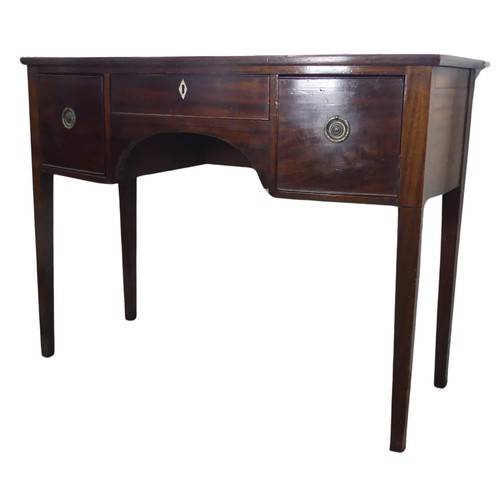 586 - A Georgian mahogany bow-front dressing Table, central drawer with ivory escutcheon flanked by deep d... 