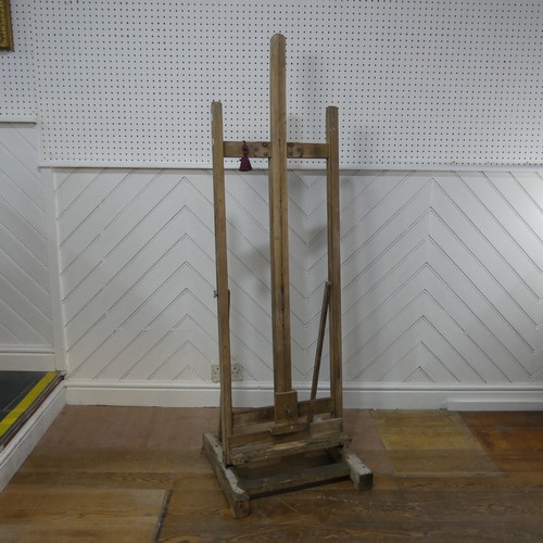 628 - A vintage floor standing artists Easel, with an adjustable canvas support, W 52 cm x H 160 cm x D 48... 