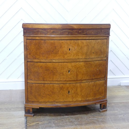 632 - A George III burr walnut and mahogany bowfront Chest of drawers, of small proportions, the bowed top... 